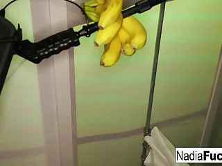 Hot Nadia White stuffs her hungry holes with very drugged bananas&excl;